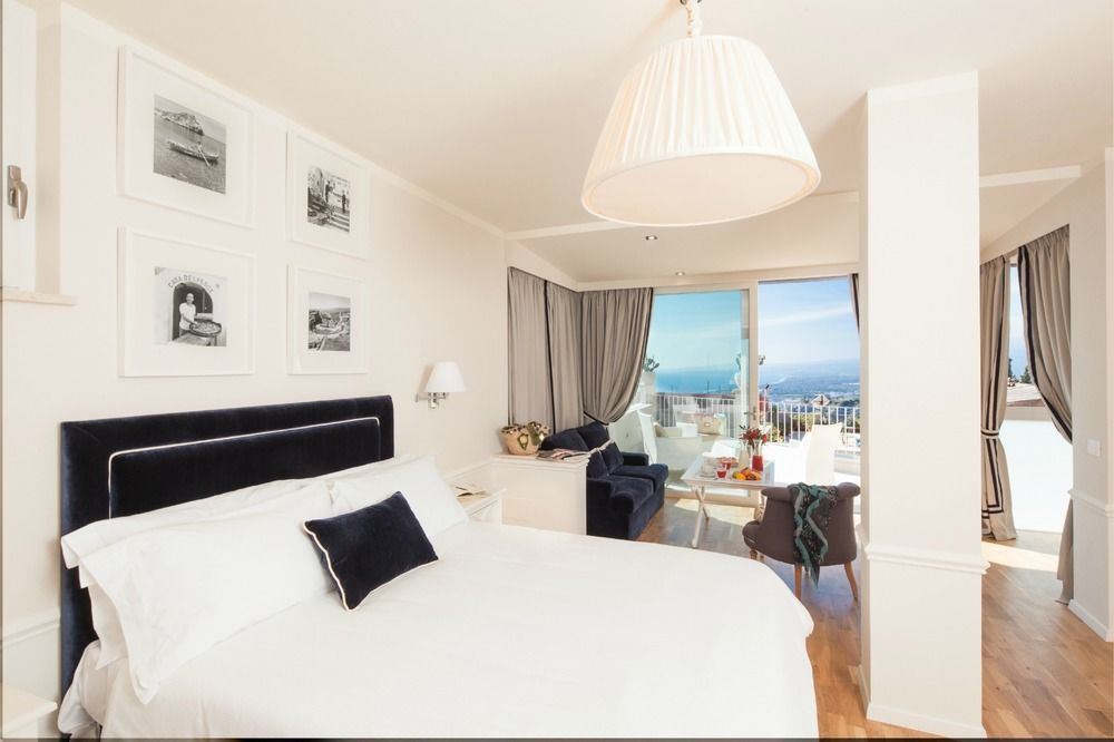 ลา มาลันดรินา Aparthotel ตาออร์มินา ภายนอก รูปภาพ